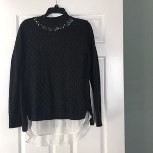 Sweater with crystal detail.